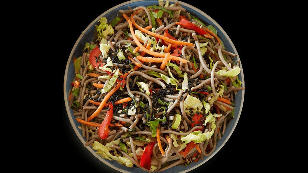 Soba Noodle Salad · Try it hot or cold, our Soba Noodle bowl is high in fiber to promote healthy digestion. Made with 100% gluten-free buckwheat soba noodles, napa cabbage, carrots, red bell pepper, cilantro, green onion, and a creamy sesame almond sauce, this feel-good dish is hearty, flavorful, and guilt-free.. All of our products are organic, gluten-free, dairy-free, and non-GMO.. INGREDIENTS . Napa Cabbage*, Soba Noodle* (Soba Noodle* [Buckwheat Flour*, Water], Filtered Water, Sesame Oil*), Carrot*, Red Bell Pepper*, Black Sesame Seed*, Green Onion*, Cilantro* . DRESSING INGREDIENTS:. Rice Vinegar*, Sesame Oil*, Almond Butter* (Almond*), Maple Syrup*, Extra Virgin Olive Oil*, Tamari* (Water, Soybean*, Salt, Alcohol*), Ginger*, Cilantro*, Himalayan Pink Salt. CONTAINS:. Almond, Soy. * ORGANIC