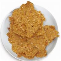 Carrot Curry Crackers · Our Carrot Curry Crackers are dehydrated crisps made from fresh carrot juice, sunflower seed...