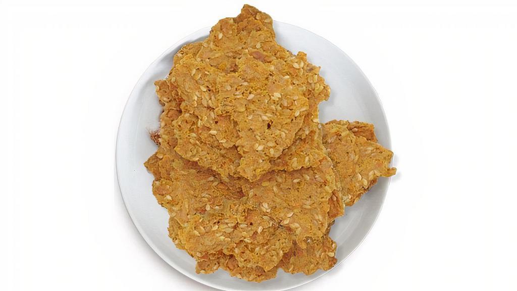Carrot Curry Crackers · Our Carrot Curry Crackers are dehydrated crisps made from fresh carrot juice, sunflower seeds and curry powder to ease inflammation. Enjoy this spicy-sweet snack on their own or as a cracker substitute.. All of our products are organic, gluten-free, dairy-free, and non-GMO.. INGREDIENTS. Carrot*, Sunflower Seed*, Lemon Juice*, Flax Seed*, Coconut Sugar*, Extra Virgin Olive Oil*, Himalayan Pink Salt, Curry Powder*, Cayenne*. CONTAINS:. Coconut. * ORGANIC