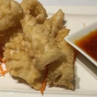 A7. Fried Calamari · Lightly battered calamari and served with a spicy sauce.