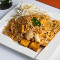 N10. Pad Thai · Thai pan-fried rice noodles with chicken, egg, tofu, peanuts, bean sprouts, and green onions.