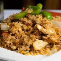 R3. Spicy Basil Thai Fried Rice · Spicy fried rice Thai style with egg, onions, bell peppers, fresh chili, garlic, and Thai ba...