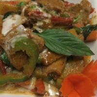 SP8. Lamb Jungle Curry · Tender Australian lamb in a rich and spicy curry with bamboo shoots, bell peppers, green pea...