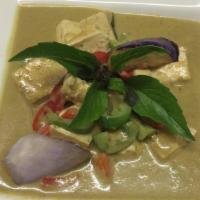 V9. Green Curry with Tofu · Green curry with tofu, eggplant, green peas, bell peppers, and Thai basil cooked in coconut ...
