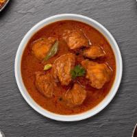 Cluck Chuck Homestyle Curry · Free range chicken thigh in a tomato based onion gravy with freshly ground spices.