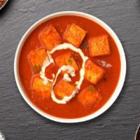 Paneer TikkaTok Burrito · Fresh cubes of cottage cheese cooked in creamy tomato sauce.