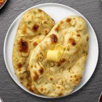 Stuffed Stop Chicken Naan · Freshly baked bread stuffed with minced chicken cooked in a clay oven.