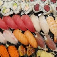 Sushi Boat A · A large assortment of sushi that serves two. 18 pieces of nigiri, California roll and tuna r...