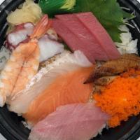 Regular Chirashi · Sashimi assortment on top of a bowl of sushi rice. (Tuna, salmon, yellowtail, octopus, white...