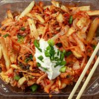 Kim Cheese Fries · Grilled Kimchi and onions, served over fresh cut fries and topped with melted cheese, green ...