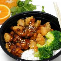 Orange Chicken · Crispy battered chicken tossed in our delicious orange sauce, served with steamed broccoli.
