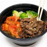 Steak + Kimchi · Korean BBQ Tri Tip served with Kim Chi and Steamed Brocolli