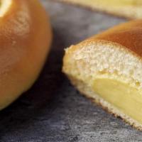 Choux Cream Bread · Soft dough, choux cream.

Contains: Coconut, Egg, Milk, Soy, Wheat