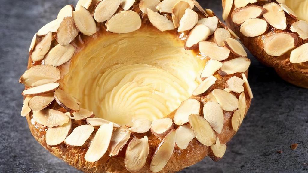 Cream Cheese Pastry · Pastry dough, Bavarian cream, cream cheese filling, sliced almonds.

Contains: Almond, Coconut, Milk, Wheat