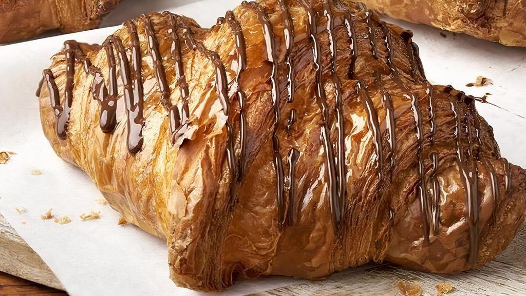 Chocolate Croissant · Butter croissant, dark chocolate filling, dark chocolate drizzle.

Contains: Coconut, Milk, Soy, Wheat