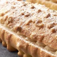 Walnut Cream Bread · Soft dough, chopped walnuts, walnut and almond cream.

Contains: Coconut, Egg, Milk, Peanut,...