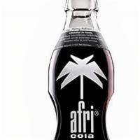 To Go Afri Cola Single · Afri Cola with real sugar. Afri cola is the iconic German cola soft drink that has been arou...