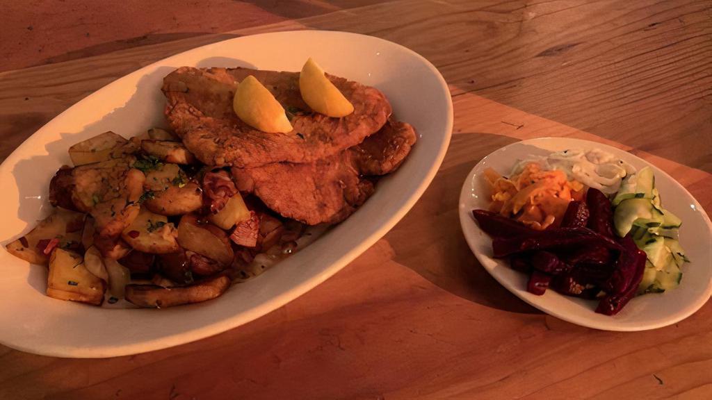 *Wienerschnitzel* · Two Pork Cutlets, breaded & pan-fried served with Roasted Potatoes w/ Bacon
(full size entree comes with German salad)