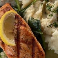 *Salmon* · Grilled Salmon served with Lemon, Dill-Cucumber sauce, Mashed Potatoes and Sautéed Spinach w...