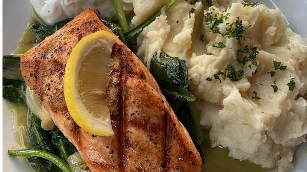 *Salmon* · Grilled Salmon served with Lemon, Dill-Cucumber sauce, Mashed Potatoes and Sautéed Spinach with Onions
(GF)