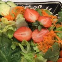 Greens Mixed Salad · Vegetarian. Romaine lettuce, grape tomatoes, cucumbers, strawberry your choice dressing and ...