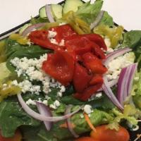 Greek Salad · Vegetarian. Organic romaine lettuce, cherry tomatoes, cucumber, be peppers, onions, pepperon...