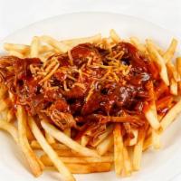 Smokin' Fries · Seasoned french fries topped with Pulled Pork, BBQ Sauce, and Shredded Cheese