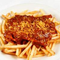 Chili Cheese Fries · Seasoned french fries topped with Brisket Chili and Shredded Cheese.