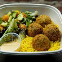 Falafel Rice Bowl · Vegan, gluten-free, vegetarian. House-made falafels, rice and house salad, orange sauce.