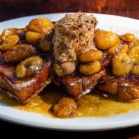 BANANAS FOSTER FRENCH TOAST · Texas French Toast, Caramelized Bananas and Cinnamon Cream