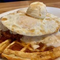 SOUTHERN COMFORT · belgian waffle stacked with country fried steak and two eggs any style with side of country ...