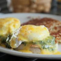 SPINACH ARTICHOKE BENEDICT · two poached eggs, creamed spinach, artichoke hearts, hollandaise sauce on grilled english mu...