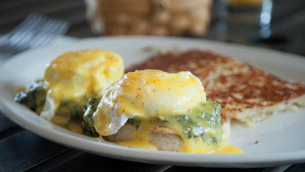 SPINACH ARTICHOKE BENEDICT · two poached eggs, creamed spinach, artichoke hearts, hollandaise sauce on grilled english muffin. Includes yukon gold hash browns