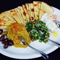 MEDITERRANEAN SAMPLER · Tzatziki, cilantro-jalapeno hummus, tabouli, marinated olives, warm pita bread