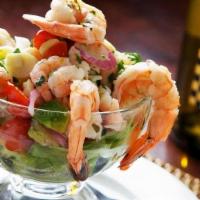 PRAWN COCKTAIL · Tiger prawns, salad of bay shrimp, hearts of palm, avocado, cherry tomatoes, red onion, cila...