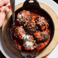 LAMB AND BEEF MEATBALLS · Fresh ground lamb and beef with spicy tomato sauce, mizithra cheese, mint