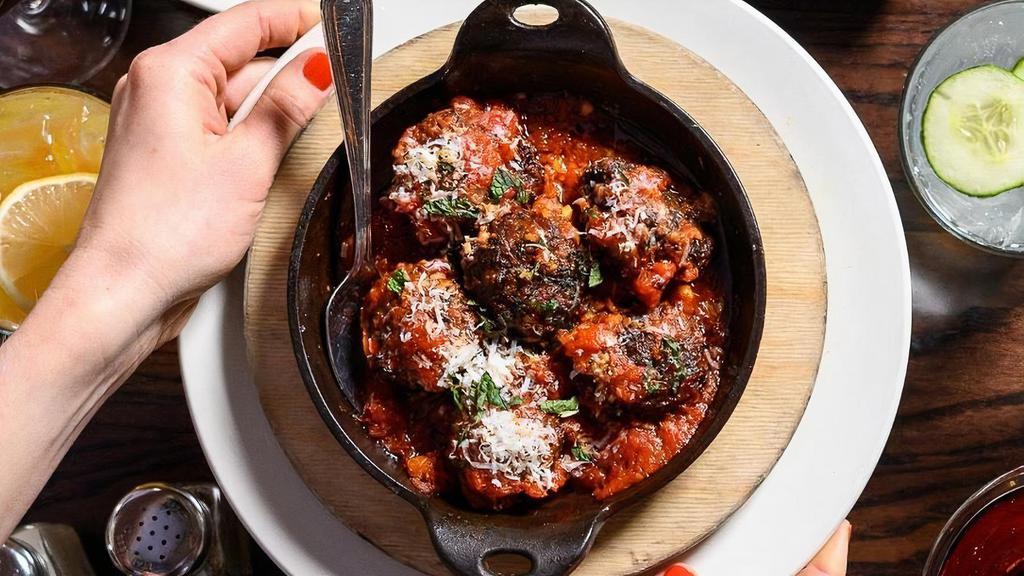 LAMB AND BEEF MEATBALLS · Fresh ground lamb and beef with spicy tomato sauce, mizithra cheese, mint