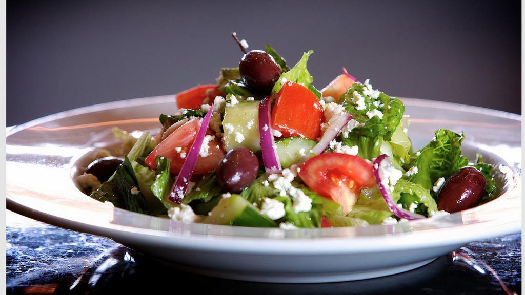 GREEK SALAD · Romaine lettuce, tomato, cucumber, bell pepper, onion, kalamata olives, feta cheese, herb vinaigrette