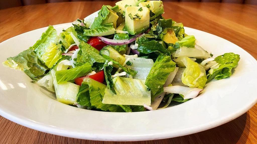 KATERINA'S SALAD · Romaine lettuce, green cabbage, cherry tomatoes, cucumber, avocado, red onion, cilantro, lemon-olive oil vinaigrette