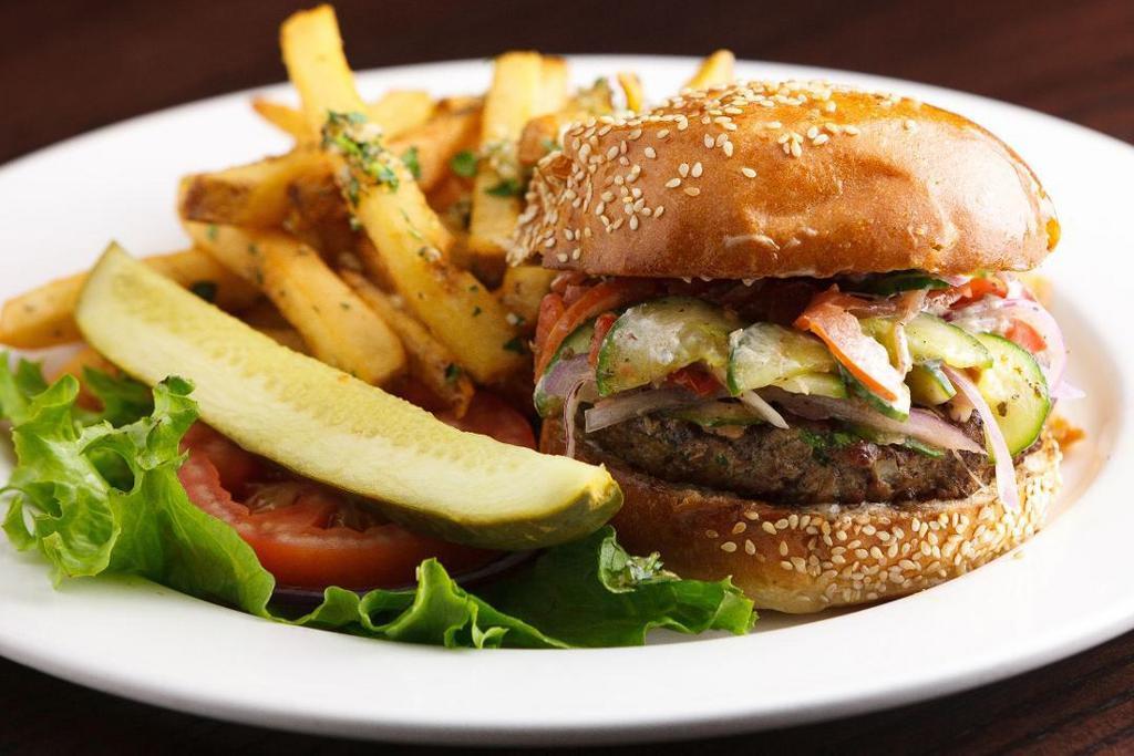 LAMB BURGER · fresh ground lamb and beef with garlic, onion, parsley and mint, topped with cucumber-tomato relish and cumin-lime aioli