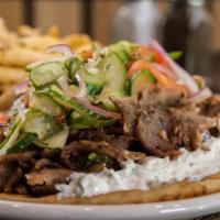 GYRO · lamb and beef combo with cucumber, tomato, onion, tzatziki, warm pita bread open faced or sa...