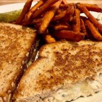 TUNA MELT · line-caught wild albacore tuna salad, melted jack and cheddar cheese, grilled whole wheat