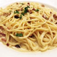 SPAGHETTI CARBONARA · pancetta (italian bacon), onion, garlic, white wine, cream, asiago cheese