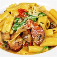 ITALIAN PASTA · rigatoni, mild italian sausage, roasted garlic, basil, mushroom, cherry tomatoes, arugula, c...