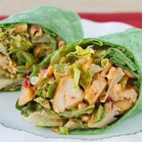 Thai Chicken Wrap · Chicken, romaine lettuce, crispy wonton noodles, red bell pepper, peanuts, and spicy peanut ...