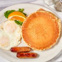 Pancake Combo · Two fluffy buttermilk pancakes, two eggs any style, two pieces of bacon or sausage.