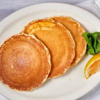 Full Stack Pancake · Three buttermilk pancakes.