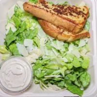 Full Caesar Salad · Large romaine lettuce salad tossed in creamy caesar dressing and shaved parmesan cheese. ser...