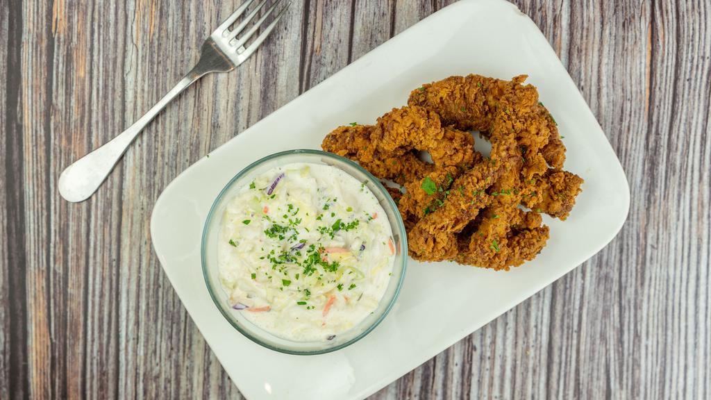 Organic Chicken Breast Strips · Marinated w in house seasonings battered and oven fried. served with side of house made coleslaw and dipping sauce. (ranch, bleu bbq, honey mustard).