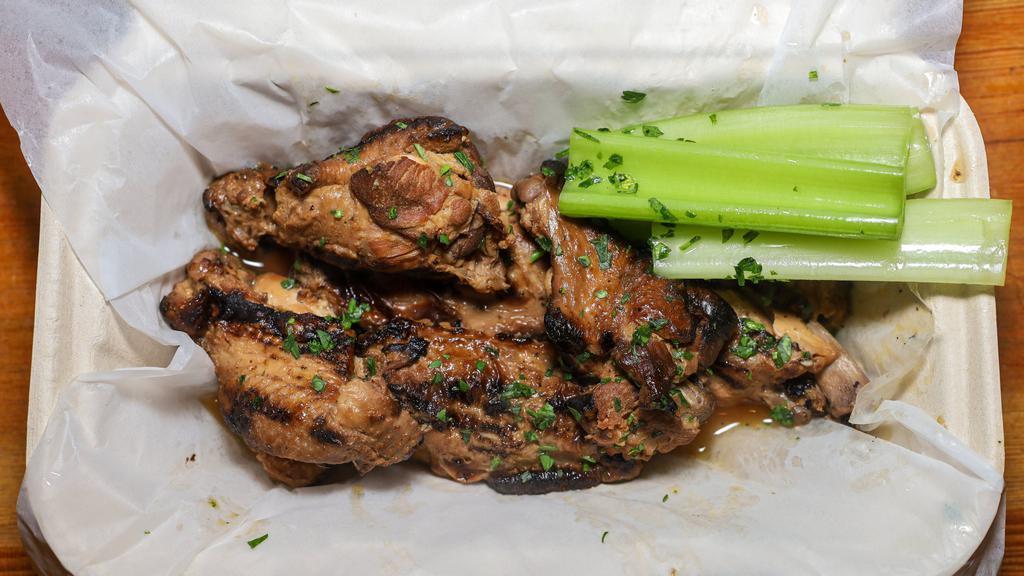 Jumbo Smoked Wings · Marinated in house seasonings and smoked to perfection. served with celery, sticks, and choice of dipping sauce ranch, blue cheese, or bbq).